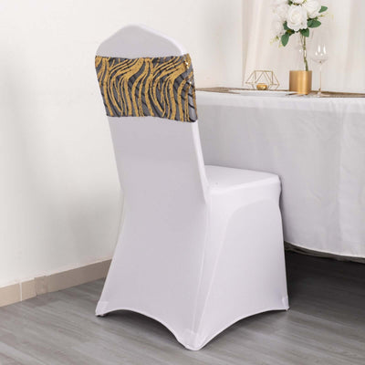 Elegant white chair with gold and gray decorative cover, styled for events.