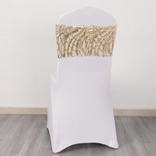 glittering sequin chair sashes in champagne color with sparkly wave pattern on a white chair
