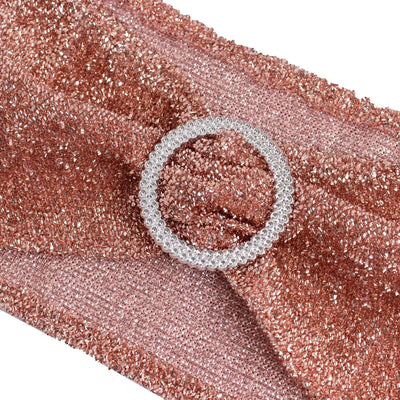 Rose gold metallic belt with crystal buckle detail.