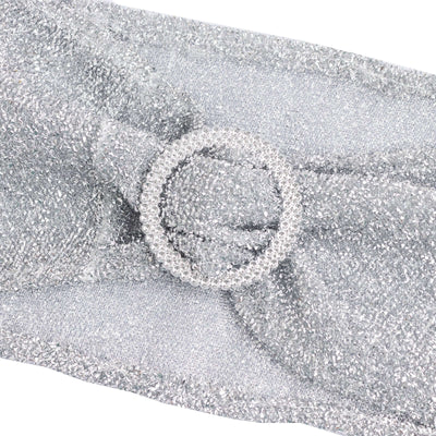Silver sparkly headband with a round rhinestone buckle.