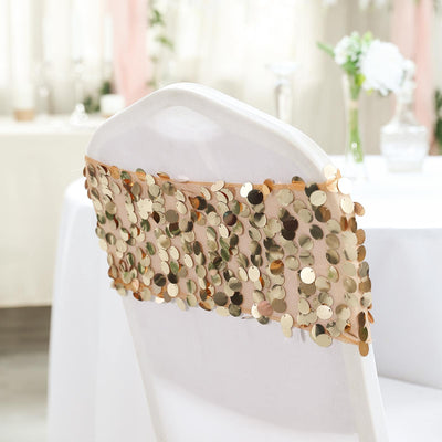 Gold sequin chair cover for elegant event decor.