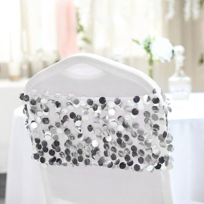 Decorative chair cover with silver sequins for elegant events.