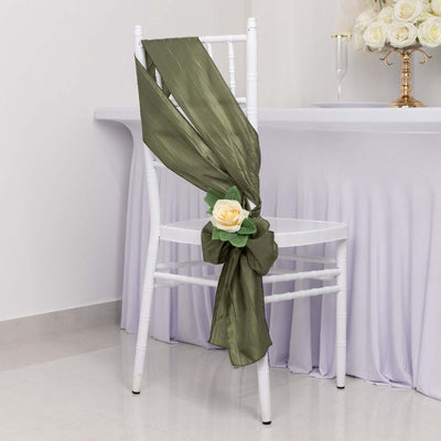 Olive green chair sash with a rose decoration on a white chair