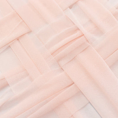 Sheer pink fabric with a woven design texture.