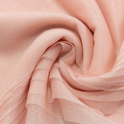 Soft pink sheer fabric with delicate shimmer texture.