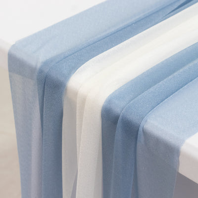 Lightweight sheer fabric in blue and white shades for versatile decor options.