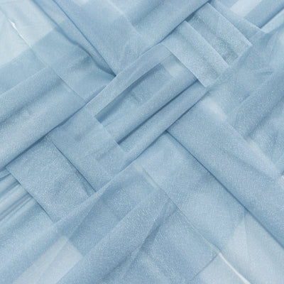Light blue sheer fabric with a textured pattern and subtle shimmer.