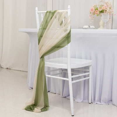 Elegant sheer fabric draped on a white chair at a decorated table.