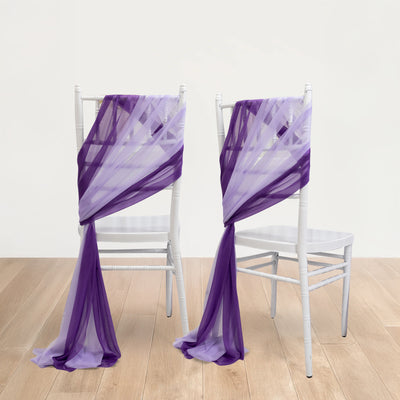 Purple tulle chair sashes elegantly draped over white chairs
