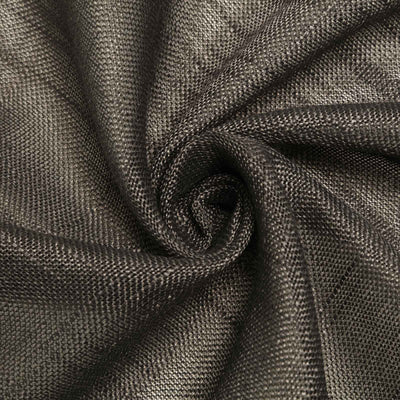 Close-up of textured black fabric in a spiral pattern.