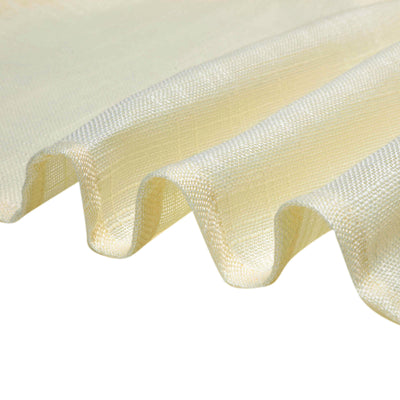 Cream-colored textured fabric draping elegantly.
