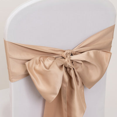 Champagne satin chair sash with a large bow