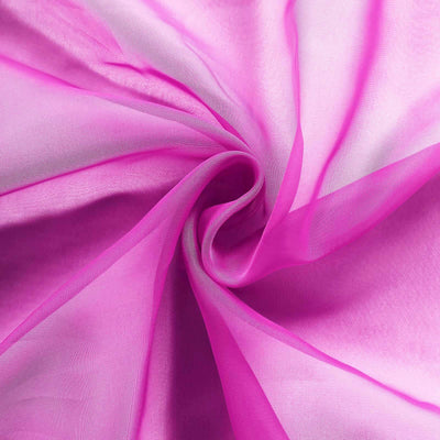 Pink sheer fabric draping in soft folds. #whtbkgd