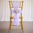 Gold chiavari chair with lavender sheer bow and floral wedding decor