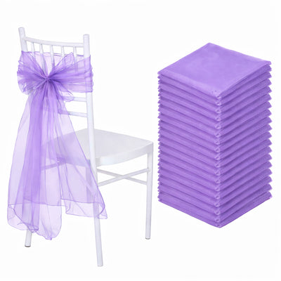 Purple chair sashes and napkins stack for elegant event decor