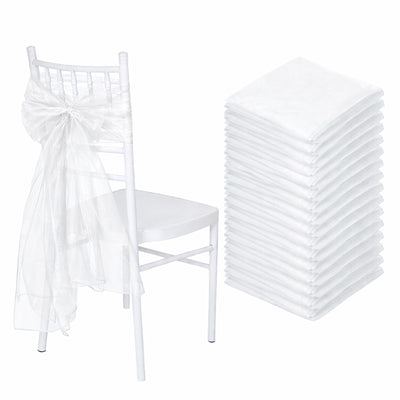 White chair sash and stack of white napkins for elegant events