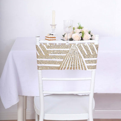 Elegant gold and white chair sash on a decorated dining chair.