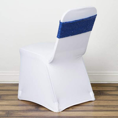 White chair with a blue sequined backrest