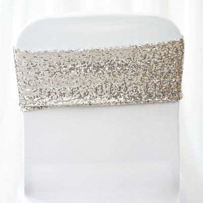Sequin chair sash in silver and gold on a white chair