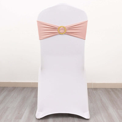 Pink chair sash with decorative buckle on a white chair