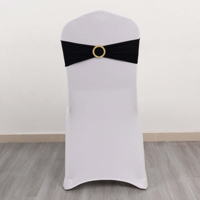 White chair with a black sash and gold buckle detail
