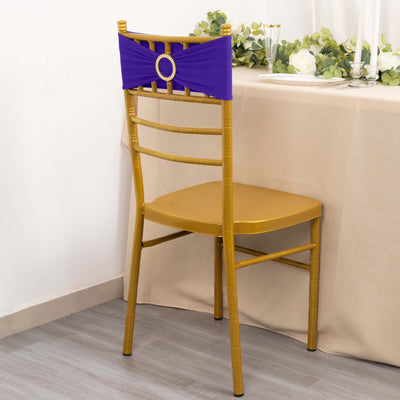 Gold chiavari chair with purple sash and decorative ring, styled for events.