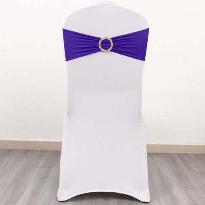 Purple chair sash with a decorative buckle on a white chair.