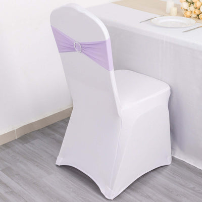 White chair cover with lavender sash for event decoration.