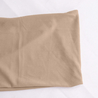 Beige fabric swatch on a plain background.
