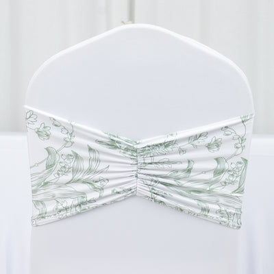 Floral patterned chair cover with ruched design on a plain backdrop