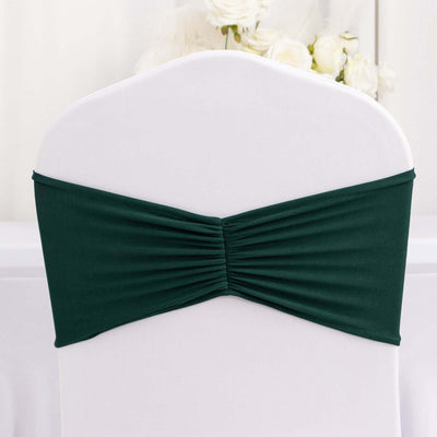 Green chair cover with pleated design for events and gatherings.
