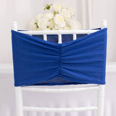 Blue chair cover with gathered design for elegant decor.