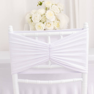 White chair cover with ruched design, ideal for weddings and events.
