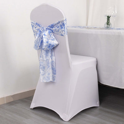 White chair cover with blue floral bow on a chair.