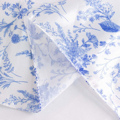 Blue floral printed fabric with delicate detailing and a soft finish.