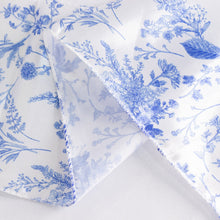 satin & taffeta chair sashes: a white cloth with blue flowers on it