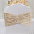 Beige velvet chair sash with gathered design for elegant decor.
