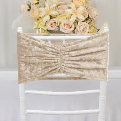 Beige velvet chair cover with ruched design.