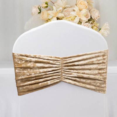 Gold velvet chair sash draped elegantly over a white chair.