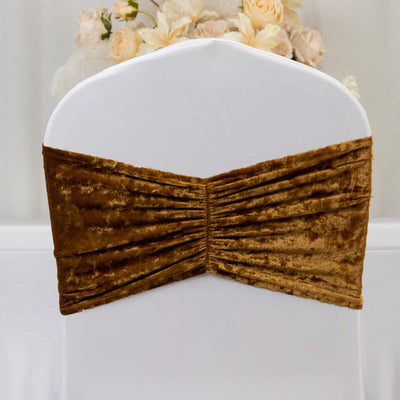 Brown velvet chair cover with gathered detail.