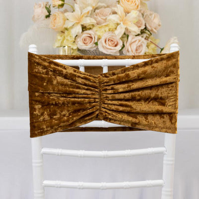 Velvet chair cover in rich brown for elegant event decor.