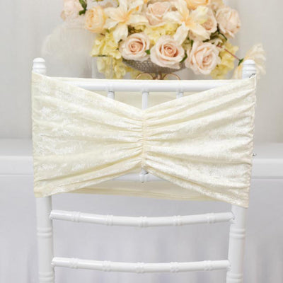 Cream chair sash with ruched design against a white backdrop.