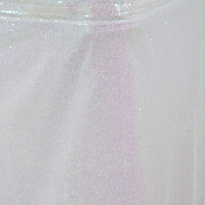 Iridescent sequin fabric with soft sheen and shimmering texture.