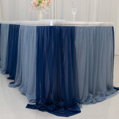 Blue and gray ombre table skirt draping elegantly over a table.