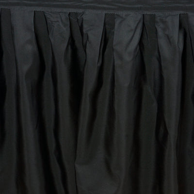 Black pleated fabric curtain with a smooth texture.