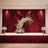 Floral arrangement on stage with red drapery backdrop.