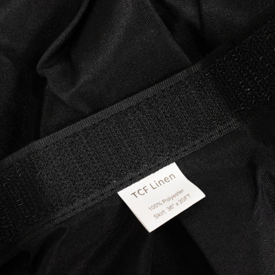 Black skirt with TCF Linen label, made of 100% polyester, 36" x 25FT.