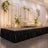 Elegant wedding stage decor with white flowers, gold frames, candles, and loveseat