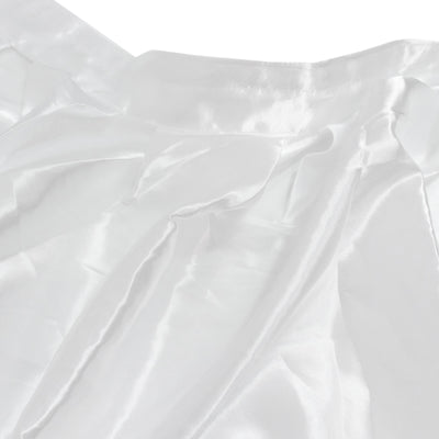 White silk fabric texture with soft folds and sheen