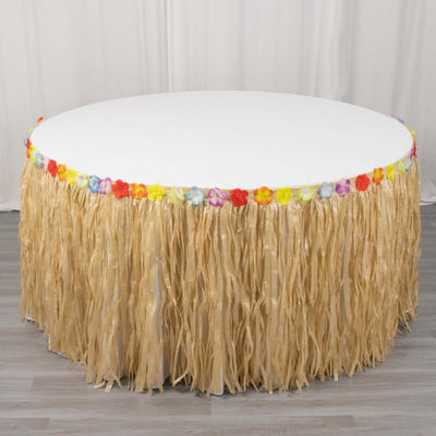 Hawaiian luau-themed table skirt with colorful flower accents